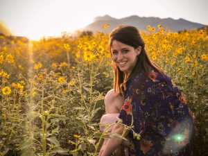 woman with sunflowers at the Grand Canyon, Arizona